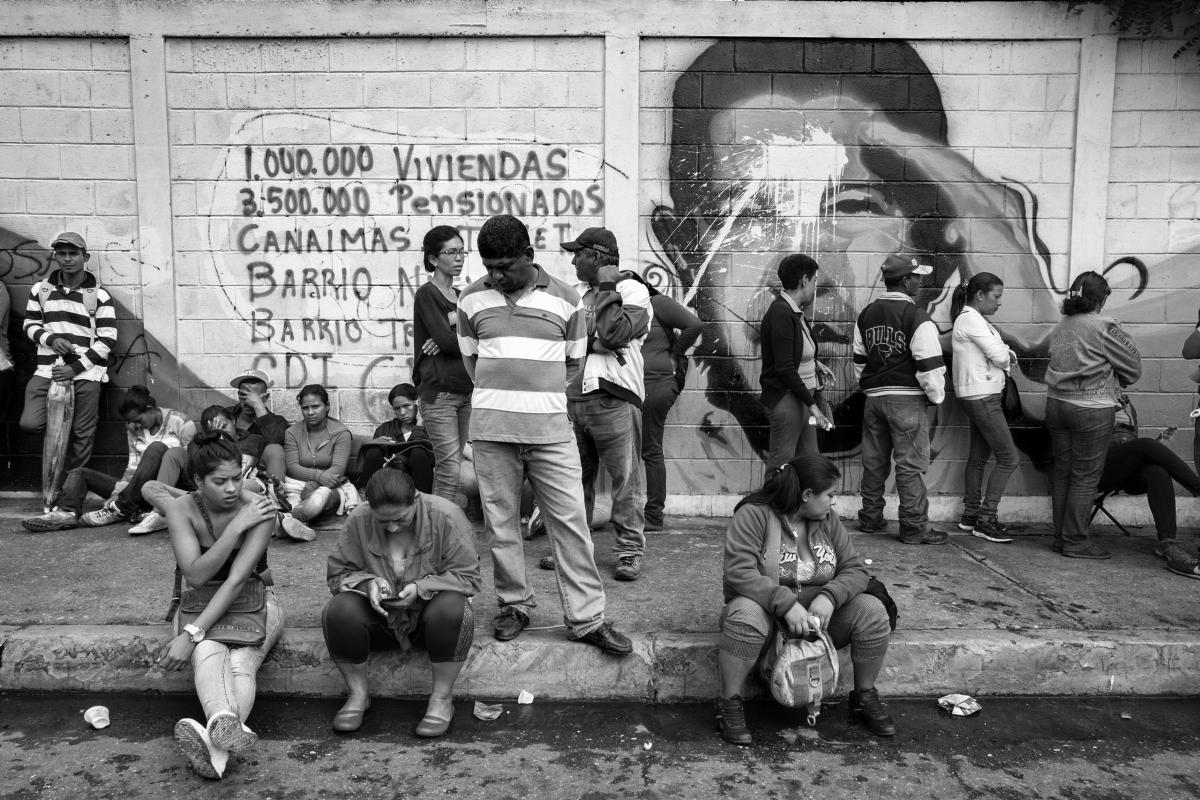 Residents of Barquisimeto wait on a food line, June 2016. Hunger across Venezuela is rising because of shortages. People often wait hours in lines that are miles long for meager supplies. As tension and discontent among the civilian population increases, violence has spread.