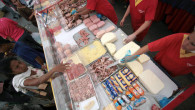 Government-subsidized goods at a state-run market in Caracas, Venezuela, in 2012. Smuggling of cheap groceries into neighboring Colombia is so rampant that the government plans to fingerprint shoppers.