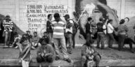 Residents of Barquisimeto wait on a food line, June 2016. Hunger across Venezuela is rising because of shortages. People often wait hours in lines that are miles long for meager supplies. As tension and discontent among the civilian population increases, violence has spread.
